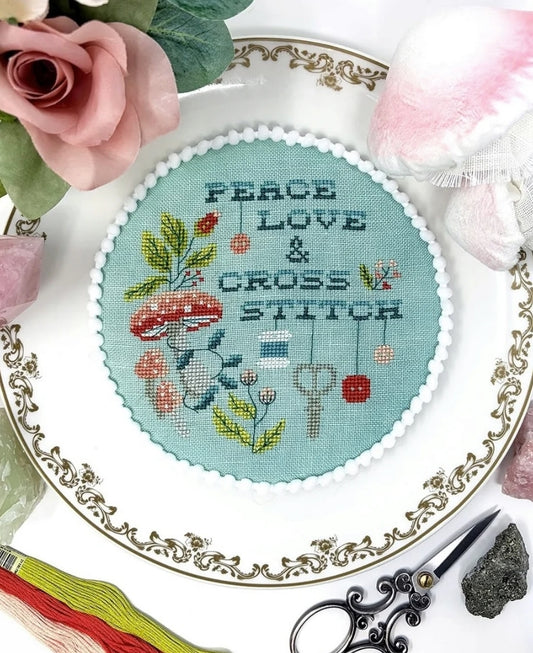 Peace, Love & Cross Stitch (2026 Plateitudes) by Tiny Modernist