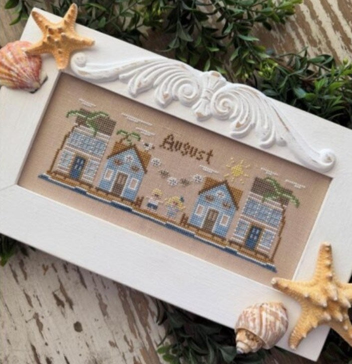 ✓ August: Monthly Mini Village by Country Cottage Needleworks